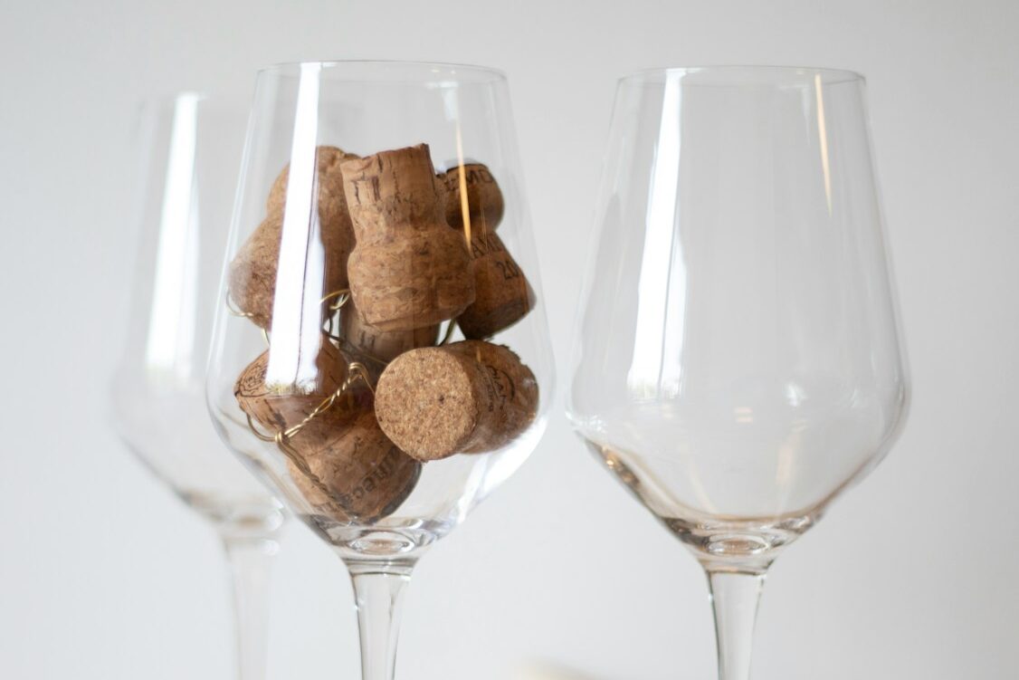 a couple of wine glasses sitting on top of a table