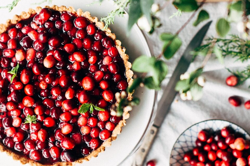 red pomegranate seeds on bowl